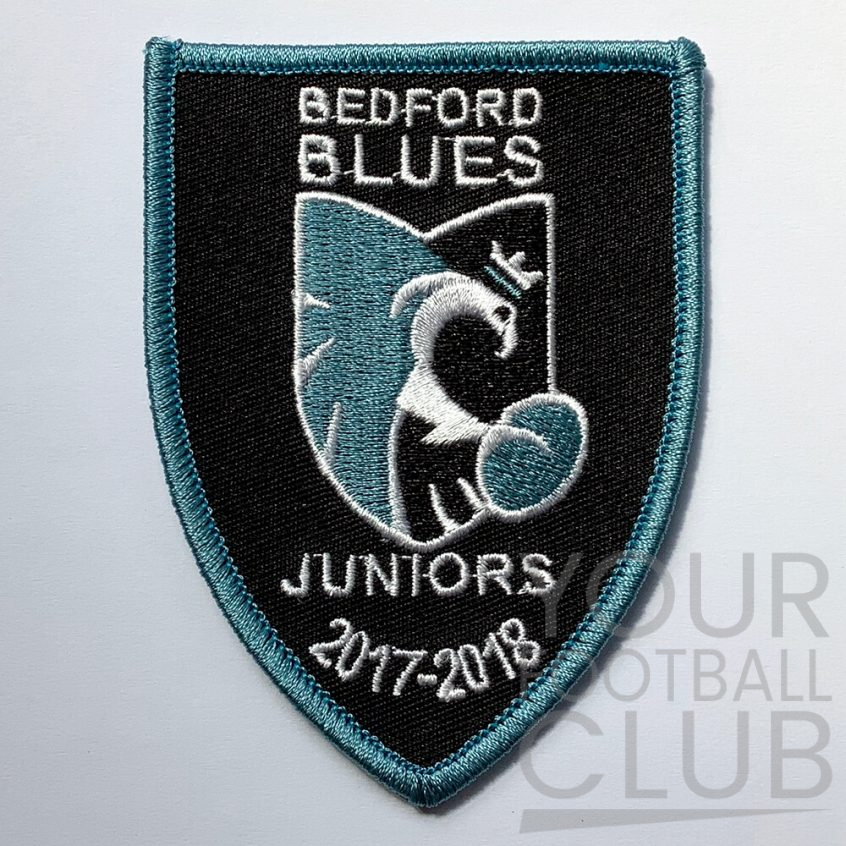 What is the Difference Between Embroidered Badges and Woven Badges